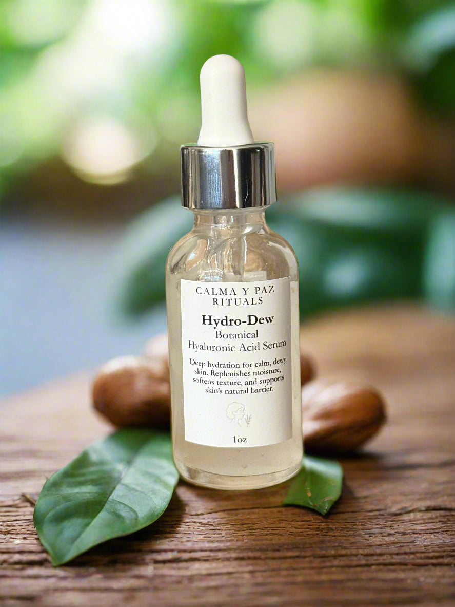 Calma y paz rituals serum bottle with label on a wooden surface